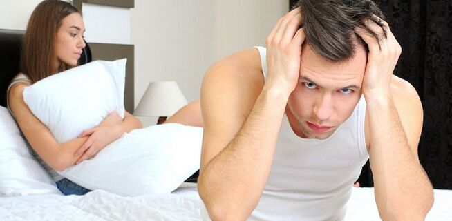 Hombre y mujer en la cama